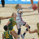 It’s a 1-on-5 as Paige Bueckers goes to the basket.